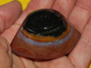 Black-and-white-and-yellow-and-orange agate eyes