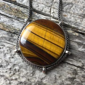 tiger eye pendant meaning